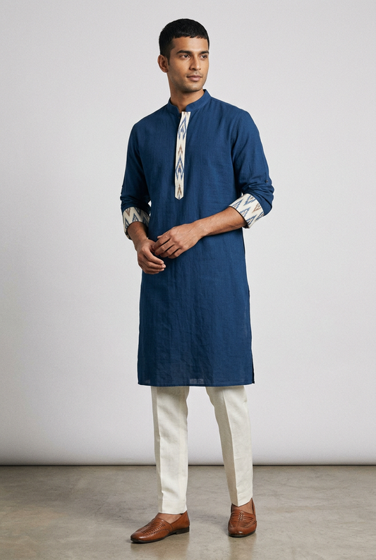 Indigo knee-length kurta with ivory Ikat-inspired cuff and placket details